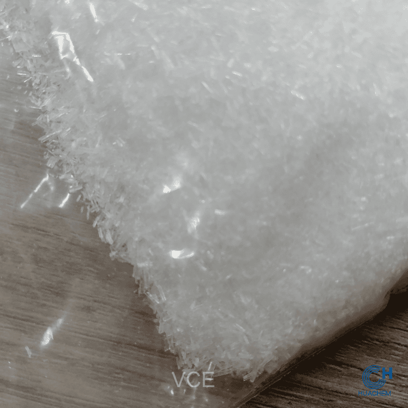 The fine, uniform, white crystalline powder texture of Huachem 3-O-Ethyl Ascorbic Acid, a high-purity cosmetic preservative.