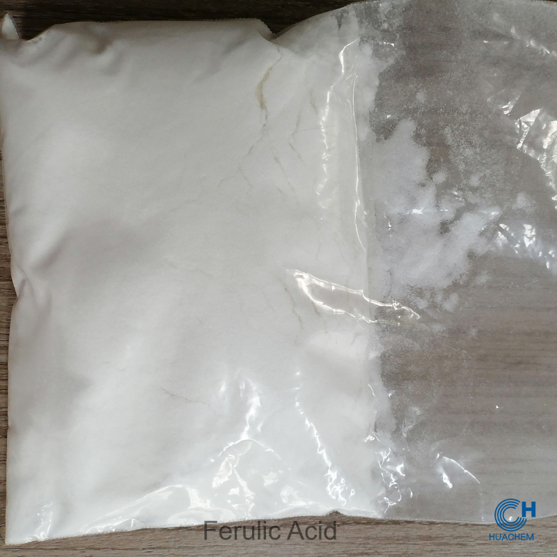 Huachem Ferulic Acid white powder visibly sealed inside a transparent inner polyethylene bag.