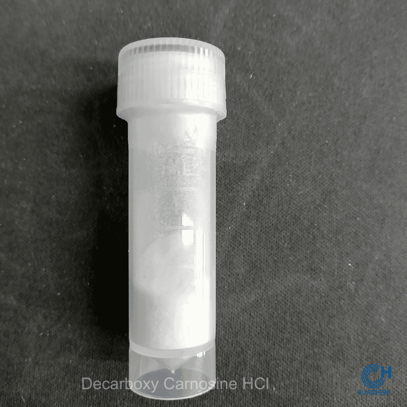 Macro photography revealing the fine, uniform, white powder texture of Huachem Decarboxy Carnosine HCl.