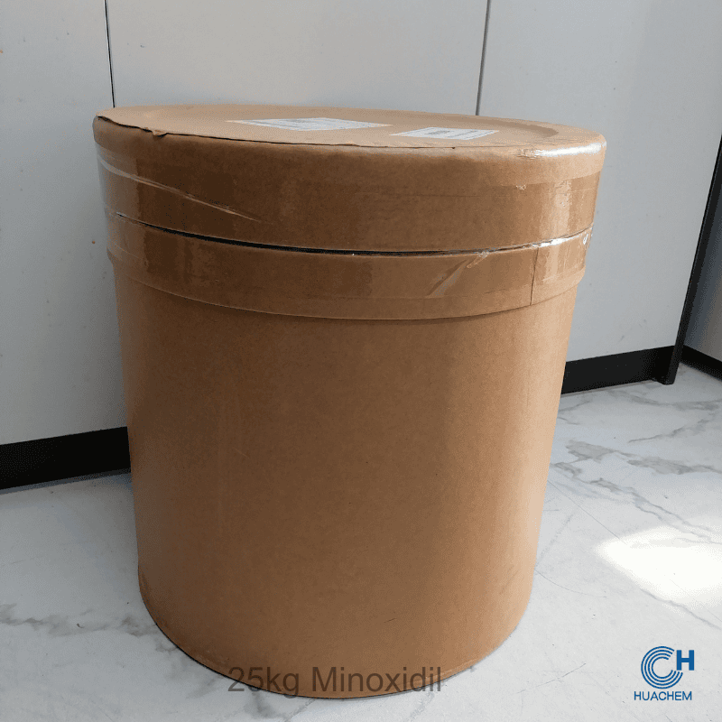 Bulk 25kg fibre drum packaging of Huachem Minoxidil, designed for industrial-scale handling and storage.