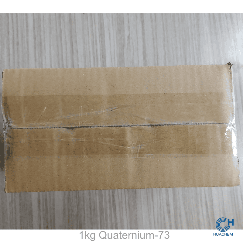 Bulk 1kg paper box packaging of Huachem Quaternium-73, designed for industrial-scale handling and storage.