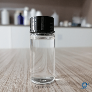 A clear glass bottle filled with high-purity Huachem Squalane 01